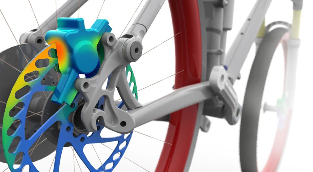 A imagem mostra uma parte de uma bicicleta simulada. A bicicleta está ampliada e não é possível enxergá-la de forma integral.